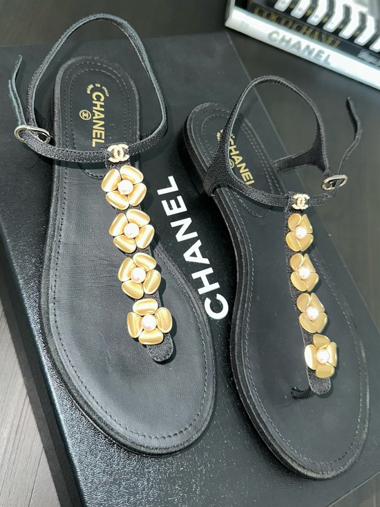 CHANEL Shoes - CHANEL Black Leather T-Strap Sandals with Gold/Pearl Flowers, Authentic